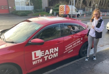Lauren learned to drive with the help of Tom